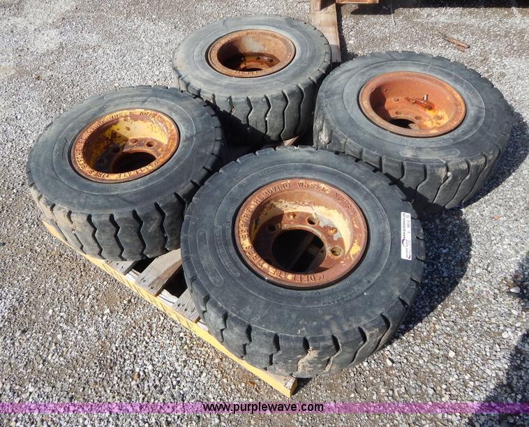 image for item V9914 (4) pneumatic 27 x 10-12 forklift tires