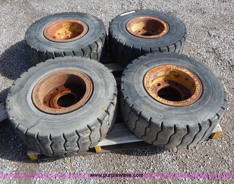 image for item V9914 (4) pneumatic 27 x 10-12 forklift tires