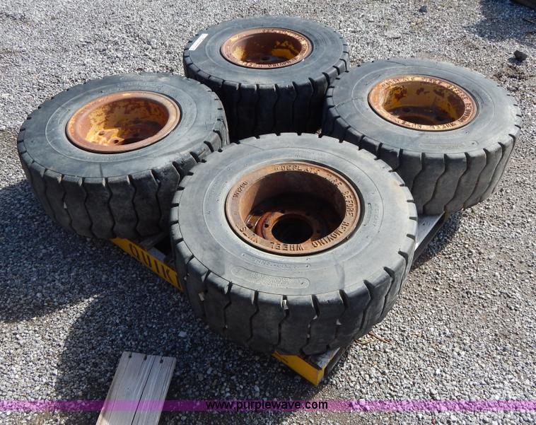 image for item V9914 (4) pneumatic 27 x 10-12 forklift tires