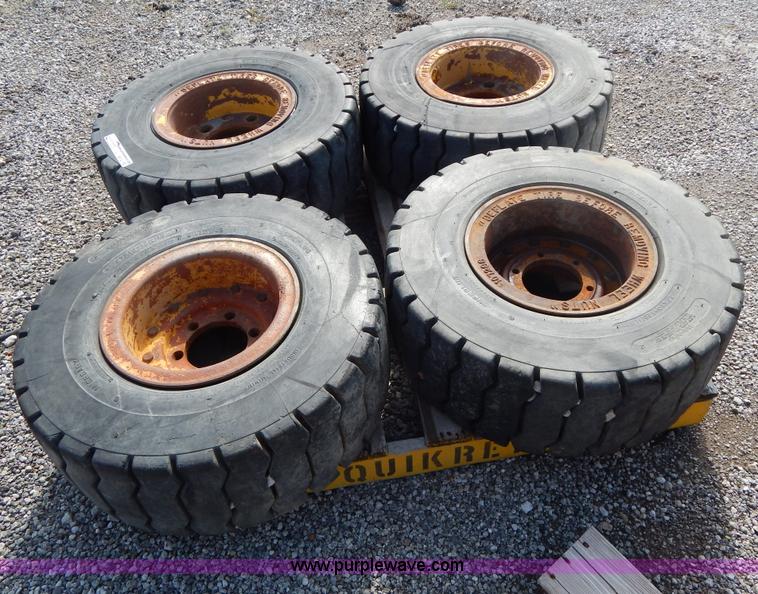 image for item V9914 (4) pneumatic 27 x 10-12 forklift tires