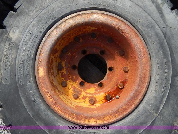 image for item V9914 (4) pneumatic 27 x 10-12 forklift tires