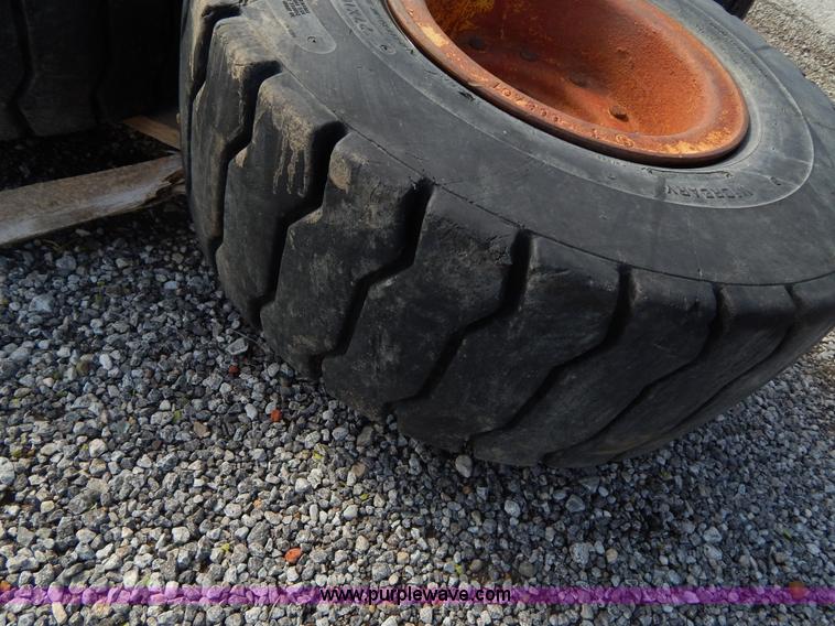 image for item V9914 (4) pneumatic 27 x 10-12 forklift tires