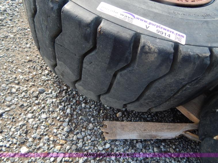 image for item V9914 (4) pneumatic 27 x 10-12 forklift tires
