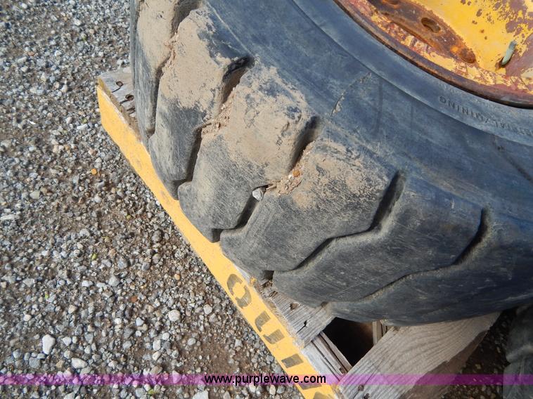 image for item V9914 (4) pneumatic 27 x 10-12 forklift tires