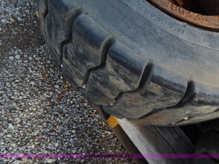 image for item V9914 (4) pneumatic 27 x 10-12 forklift tires