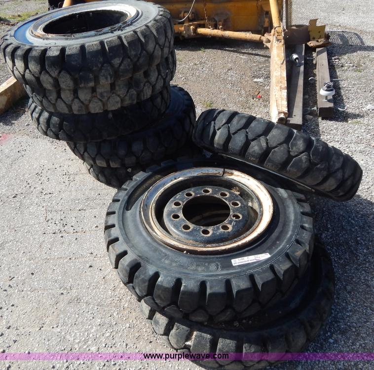 image for item V9915 (8) 8.25-20 solid forklift tires
