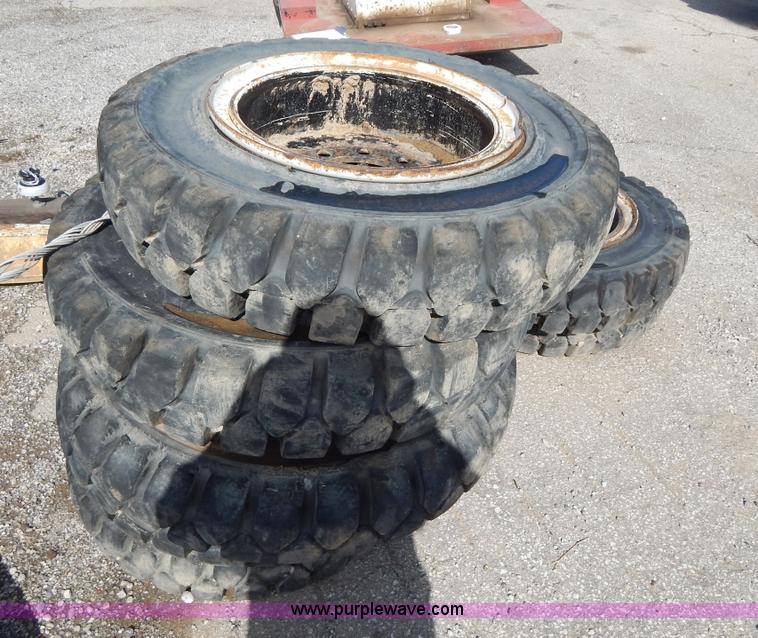 image for item V9915 (8) 8.25-20 solid forklift tires