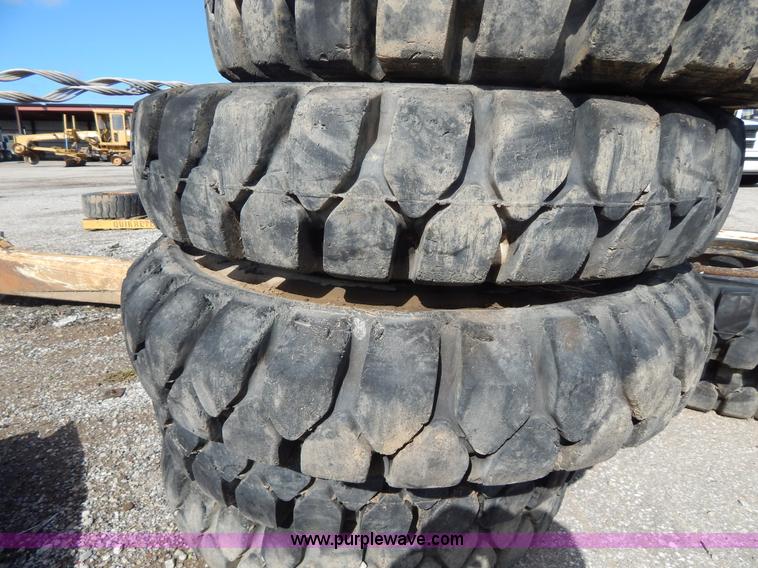 image for item V9915 (8) 8.25-20 solid forklift tires