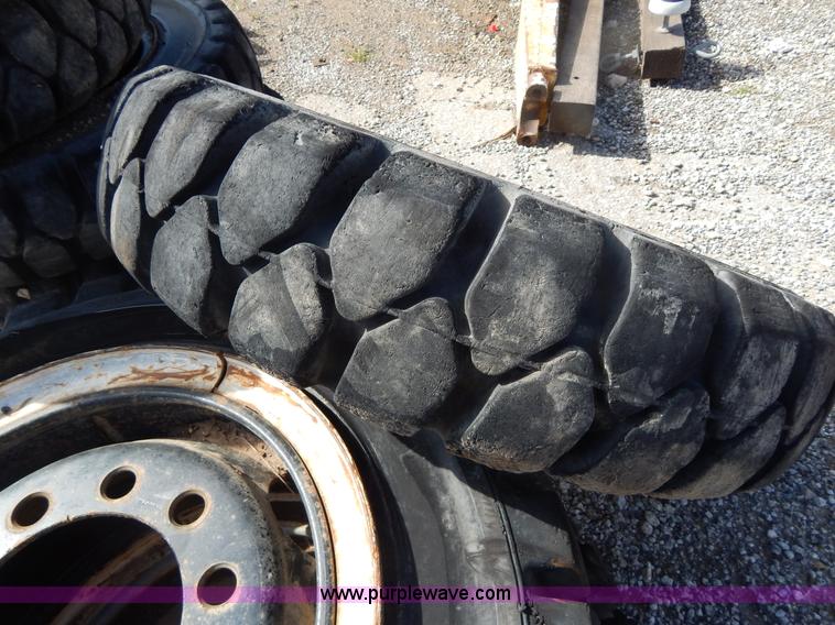 image for item V9915 (8) 8.25-20 solid forklift tires