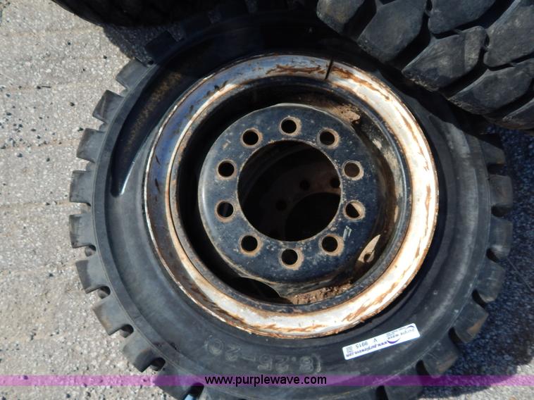 image for item V9915 (8) 8.25-20 solid forklift tires