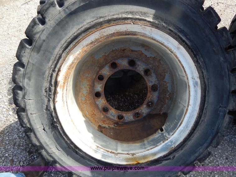 image for item V9915 (8) 8.25-20 solid forklift tires