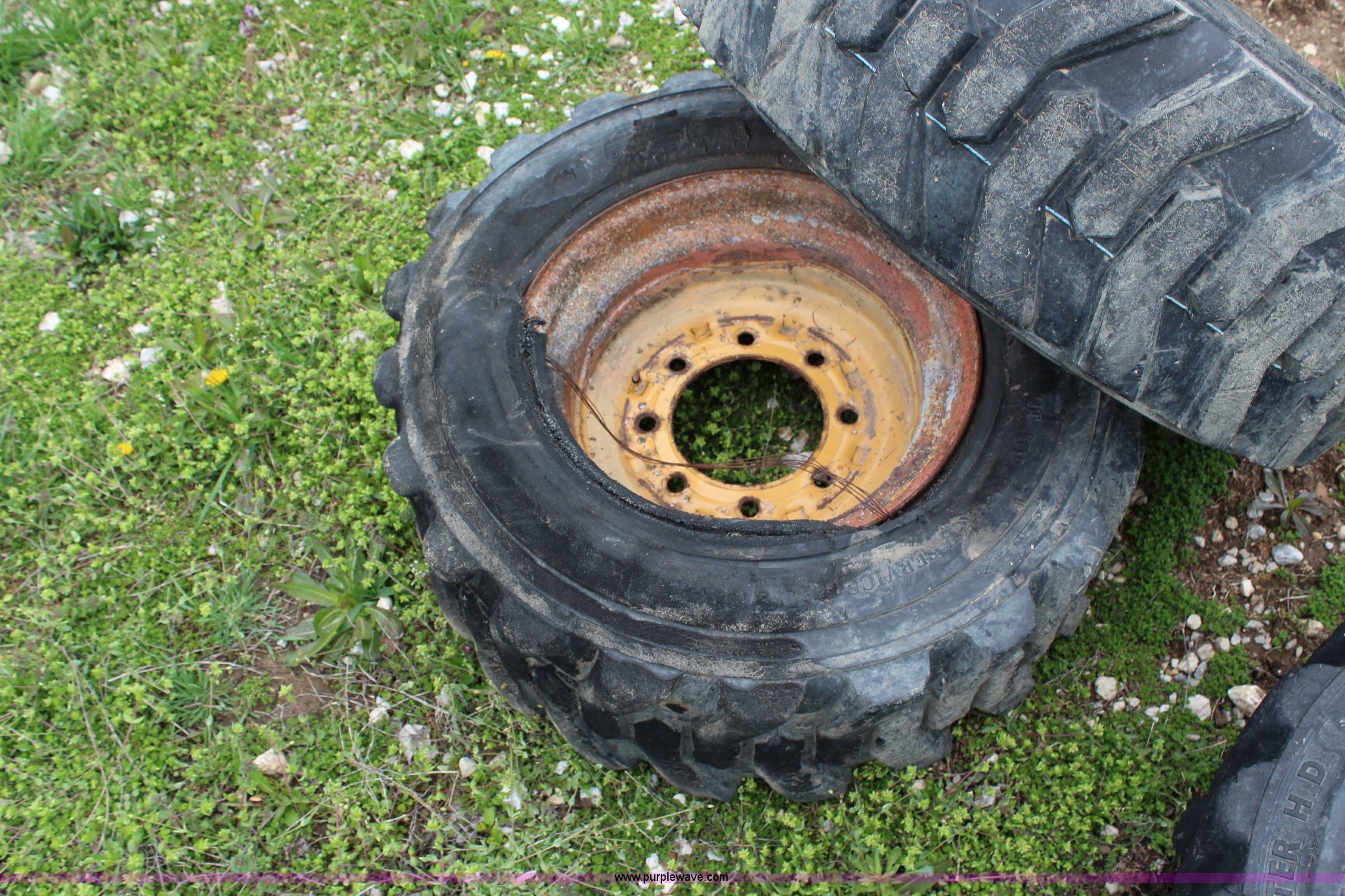 (4) skid steer tires and wheels in KS Item AJ9594 sold