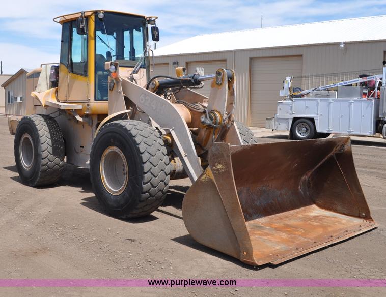 image for item G6019 1999 John Deere 624H wheel loader