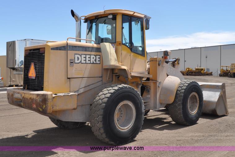 image for item G6019 1999 John Deere 624H wheel loader