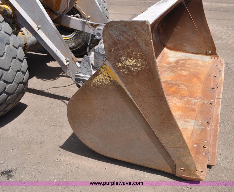 image for item G6019 1999 John Deere 624H wheel loader