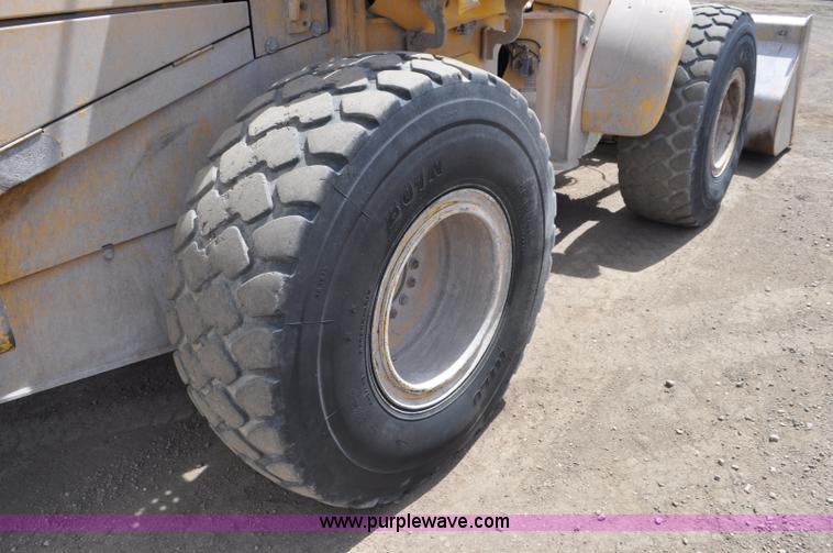 image for item G6019 1999 John Deere 624H wheel loader