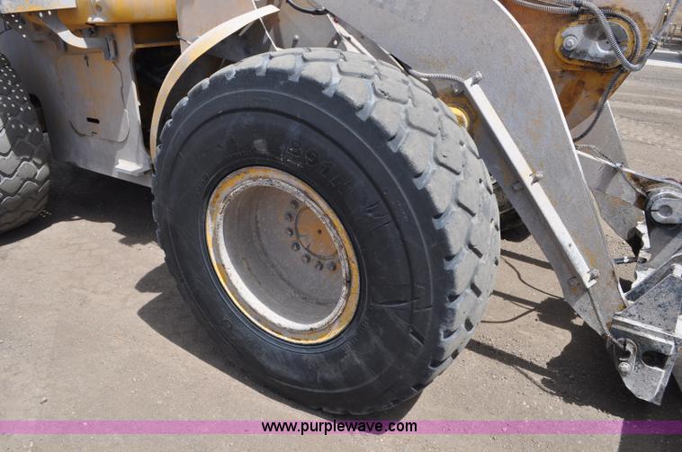 image for item G6019 1999 John Deere 624H wheel loader