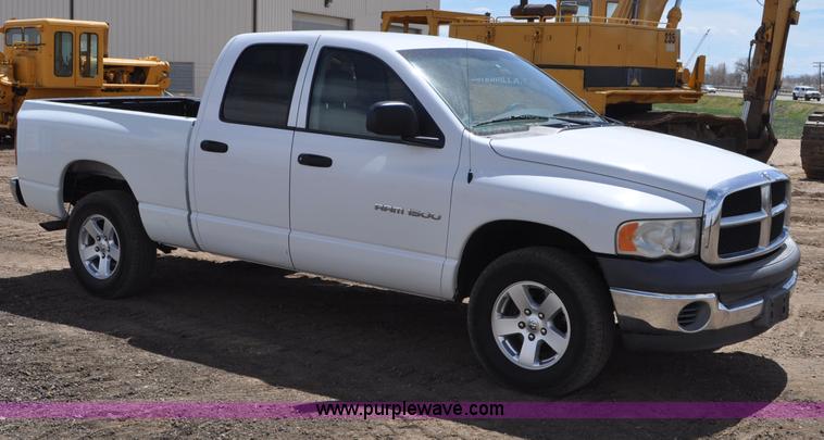 image for item G6020 2002 Dodge Ram 1500 Quad Cab pickup truck