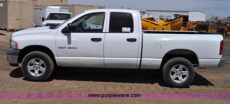 image for item G6020 2002 Dodge Ram 1500 Quad Cab pickup truck