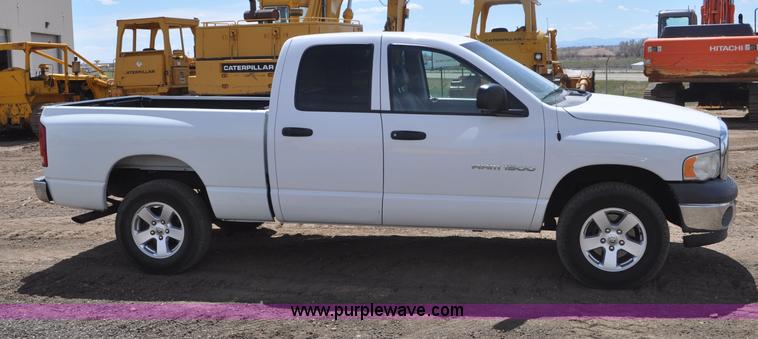 image for item G6020 2002 Dodge Ram 1500 Quad Cab pickup truck