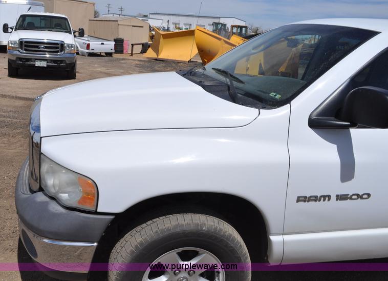 image for item G6020 2002 Dodge Ram 1500 Quad Cab pickup truck