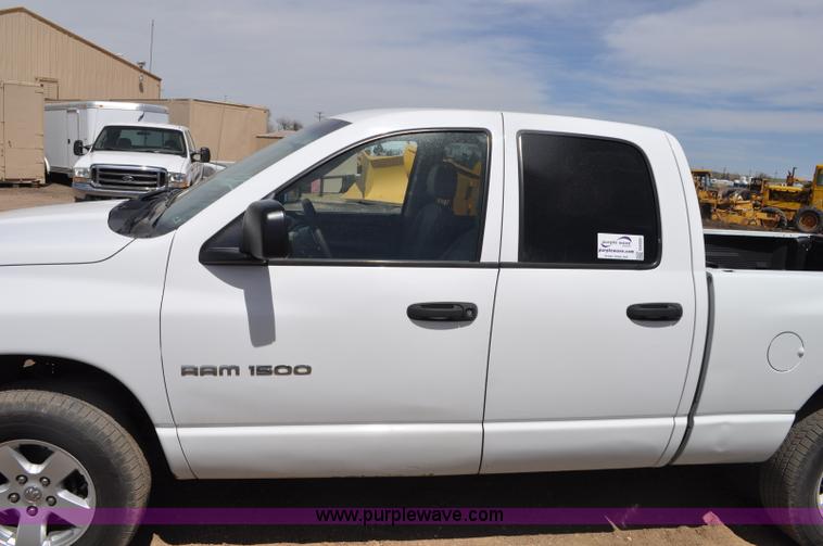 image for item G6020 2002 Dodge Ram 1500 Quad Cab pickup truck