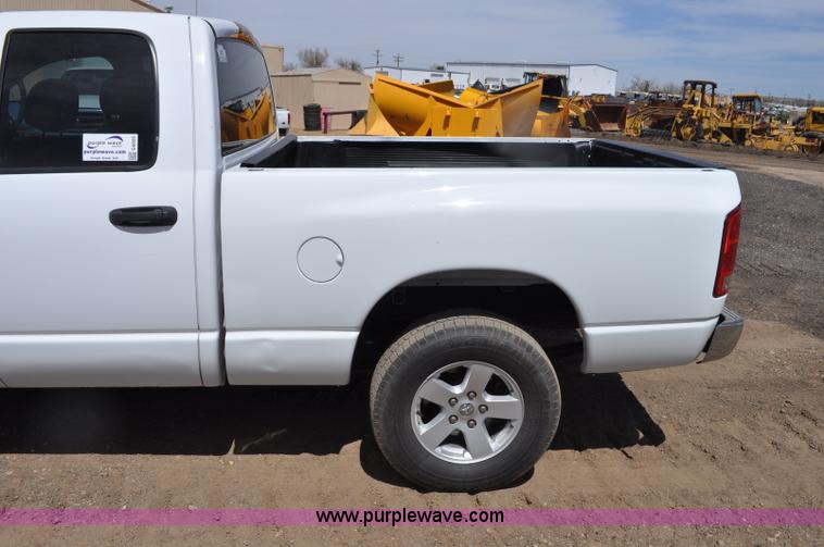 image for item G6020 2002 Dodge Ram 1500 Quad Cab pickup truck