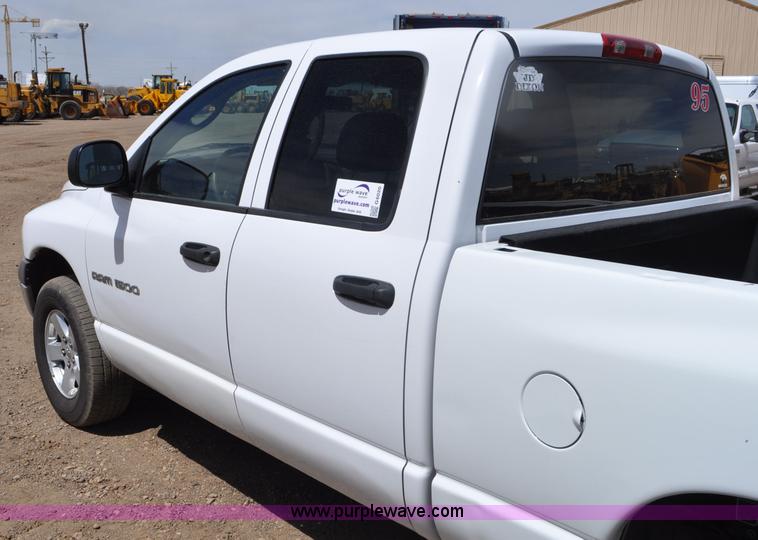 image for item G6020 2002 Dodge Ram 1500 Quad Cab pickup truck