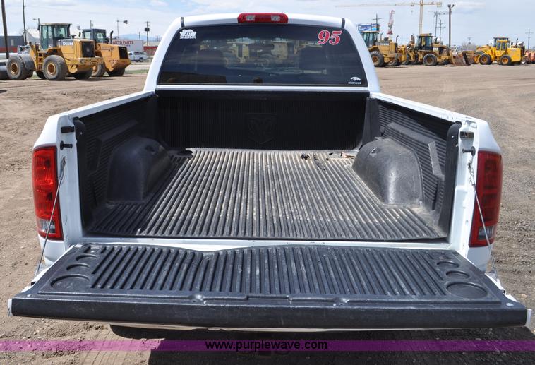 image for item G6020 2002 Dodge Ram 1500 Quad Cab pickup truck