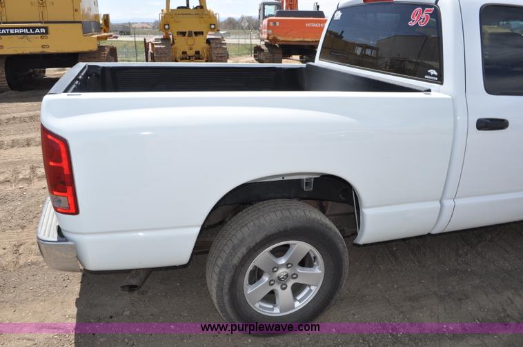 image for item G6020 2002 Dodge Ram 1500 Quad Cab pickup truck