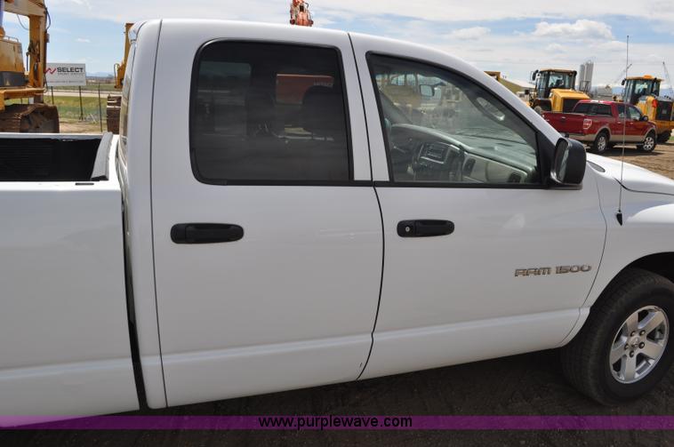 image for item G6020 2002 Dodge Ram 1500 Quad Cab pickup truck