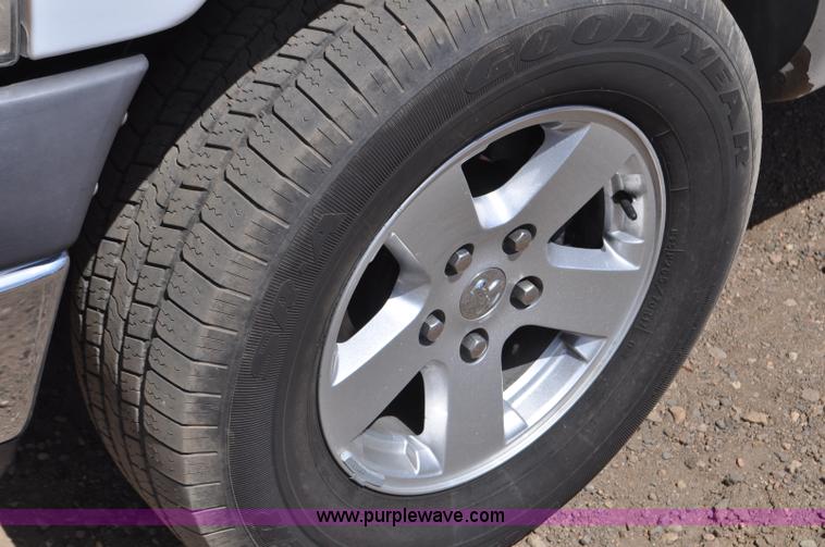 image for item G6020 2002 Dodge Ram 1500 Quad Cab pickup truck