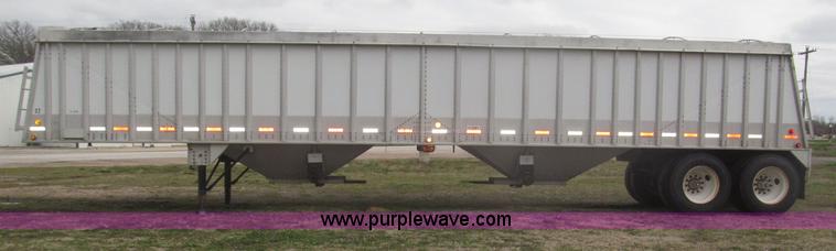 image for item B5473 1995 Corn Husker aluminum tandem axle grain trailer