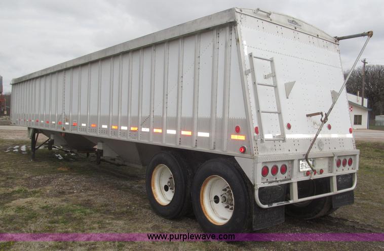 image for item B5473 1995 Corn Husker aluminum tandem axle grain trailer