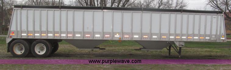 image for item B5473 1995 Corn Husker aluminum tandem axle grain trailer