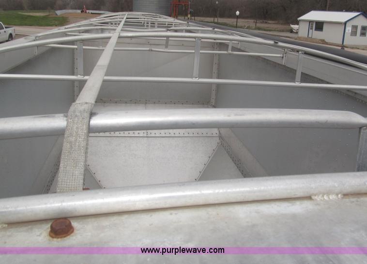 image for item B5473 1995 Corn Husker aluminum tandem axle grain trailer