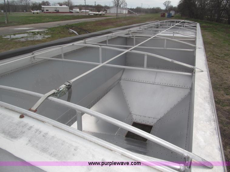 image for item B5473 1995 Corn Husker aluminum tandem axle grain trailer