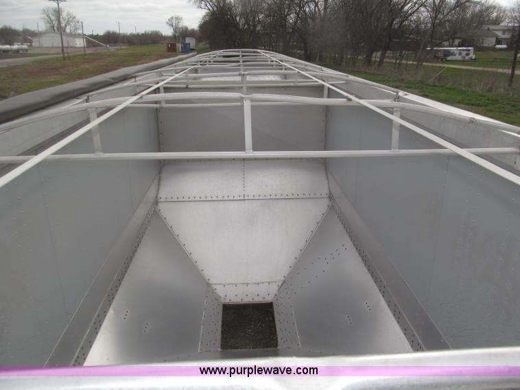 image for item B5473 1995 Corn Husker aluminum tandem axle grain trailer