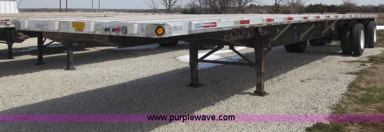 image for item D5809 2000 Utility 48' flatbed semi trailer