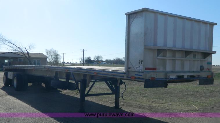 image for item G7829 1990 East aluminum flatbed trailer