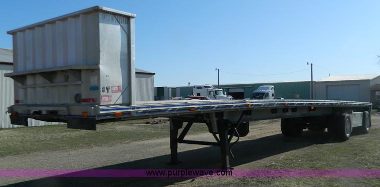 image for item G7829 1990 East aluminum flatbed trailer