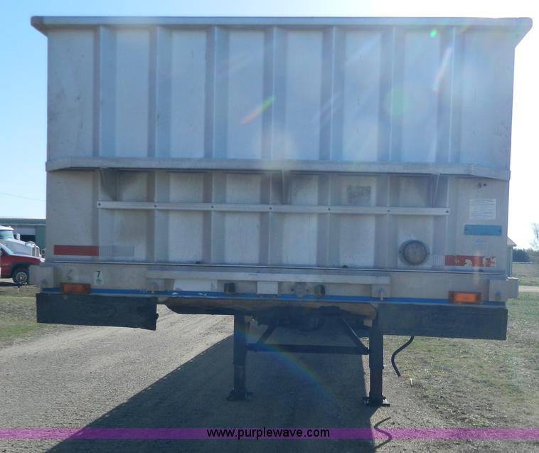 image for item G7829 1990 East aluminum flatbed trailer