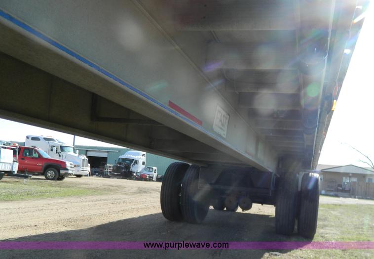 image for item G7829 1990 East aluminum flatbed trailer