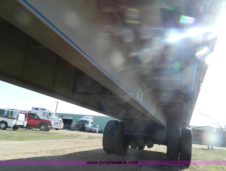 image for item G7829 1990 East aluminum flatbed trailer