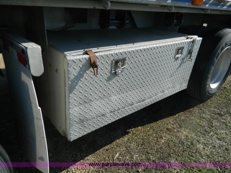image for item G7829 1990 East aluminum flatbed trailer