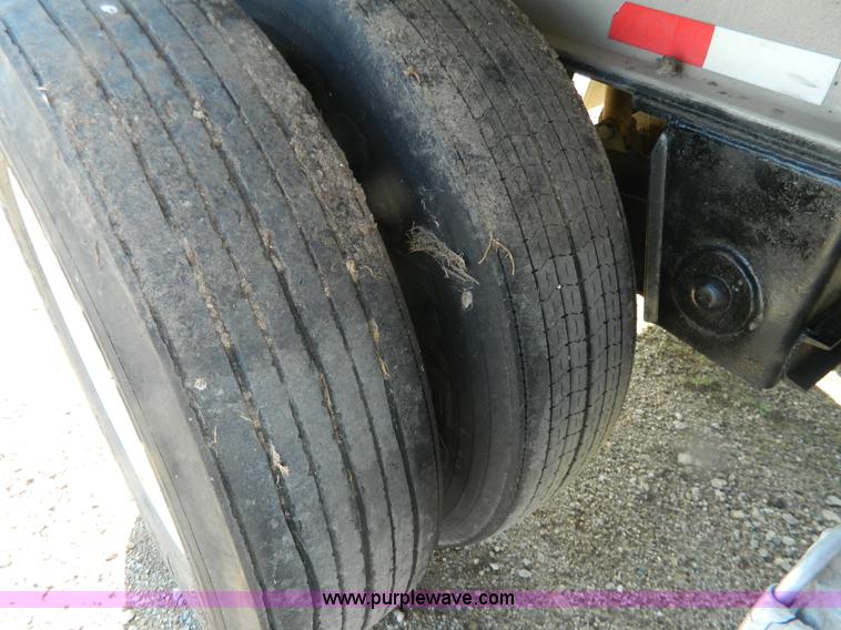 image for item G7829 1990 East aluminum flatbed trailer