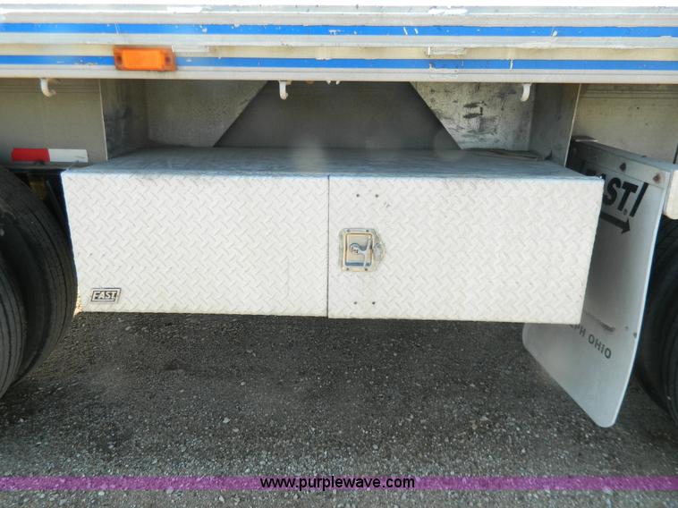image for item G7829 1990 East aluminum flatbed trailer