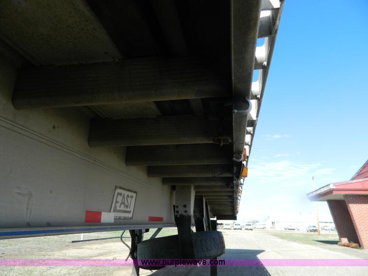 image for item G7829 1990 East aluminum flatbed trailer