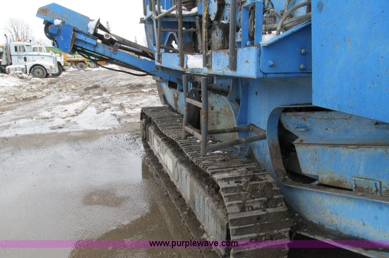 image for item E5042 2000 Terex Pegson 428 Trakpaction impact crusher