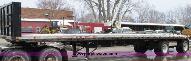 image for item E5049 1995 Trail King NXT152 flatbed trailer